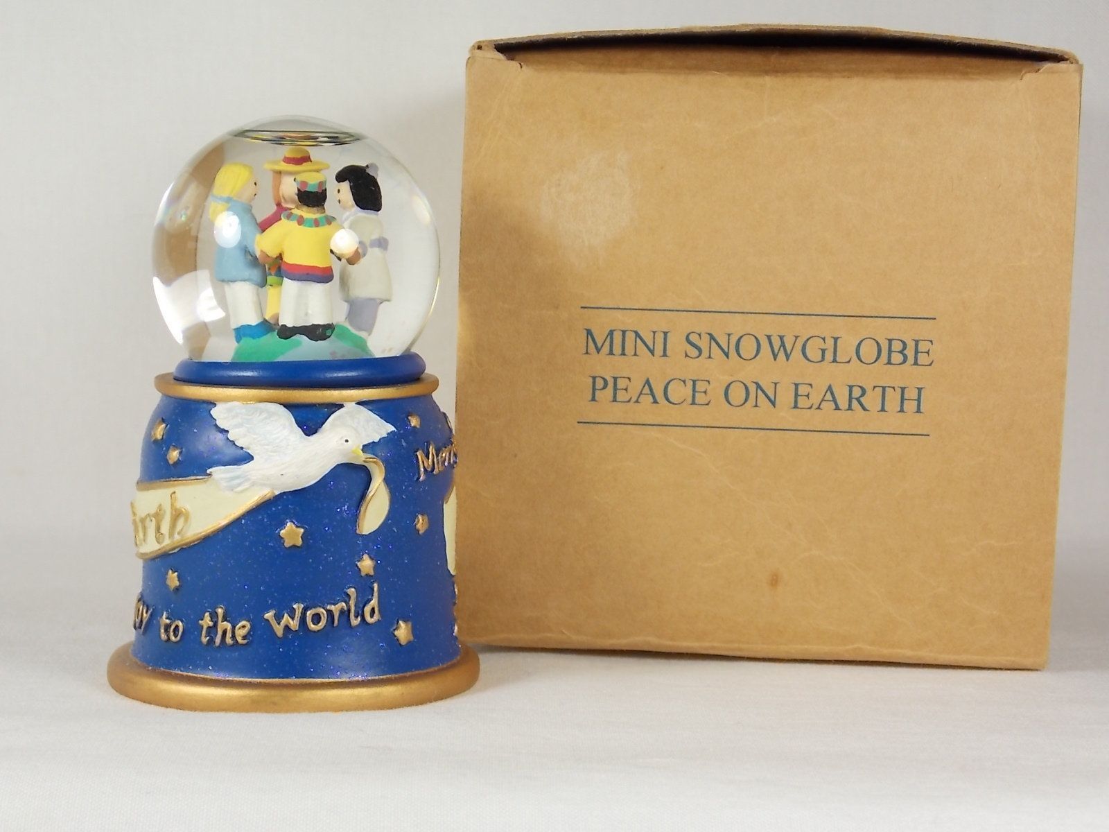 Collectible Avon Snow Globes