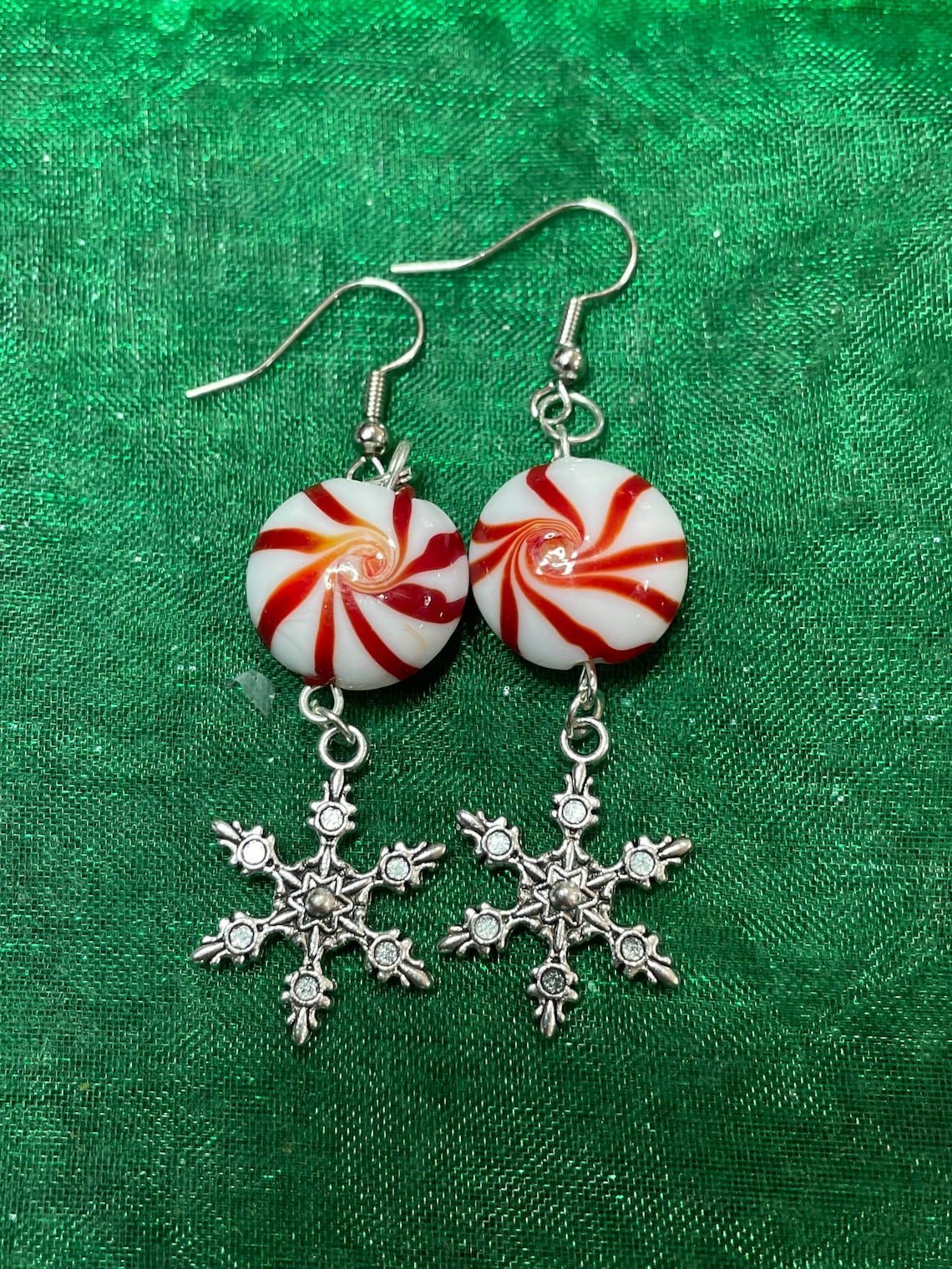 Christmas candy cane earrings with a little black dress