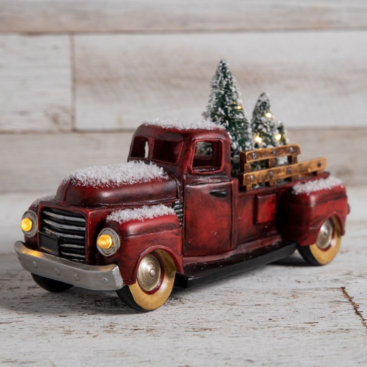 A Christmas hacker truck decorated with festive lights and hacking gear