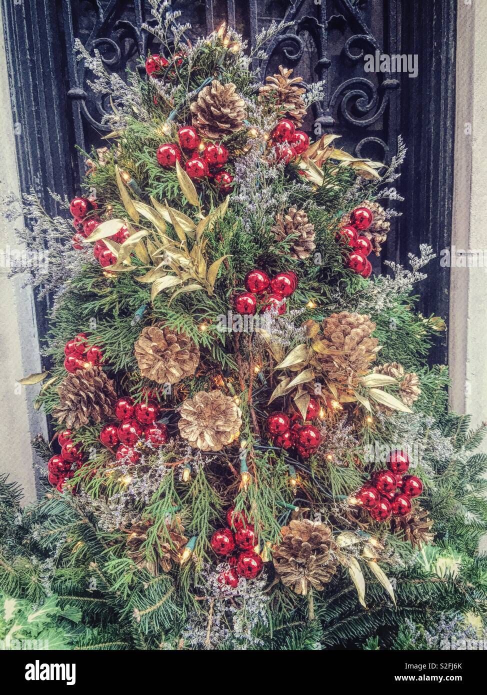 Christmas Tree with Red Berries and Pinecones